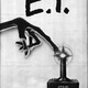 An ad for Atari's then-upcoming E.T. video game show's an alien hand touching an Atari joystick with an elongated finger.